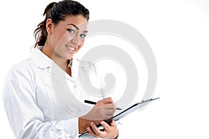 Smiling doctor with writing board