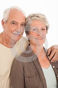 Smiling elderly couple