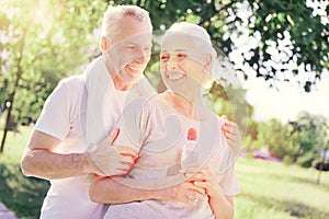 Smiling elderly family after training