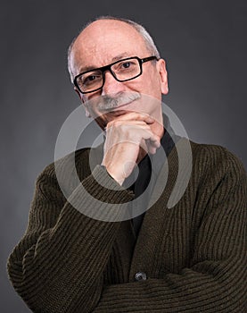 Smiling elderly man in glasses