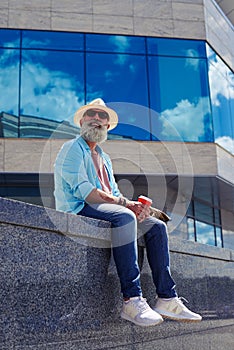 Smiling elderly man sitting