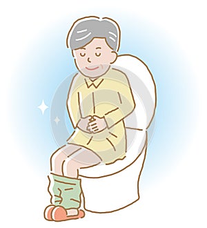 Smiling elderly man sitting on toilet seat.  Health care concept