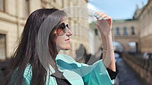 Smiling elegance tourist female wearing trendy sunglasses relaxing surrounded by sunlight