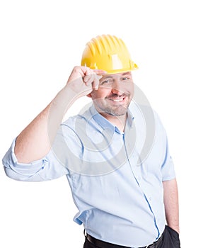 Smiling engineer or architect greeting gesture
