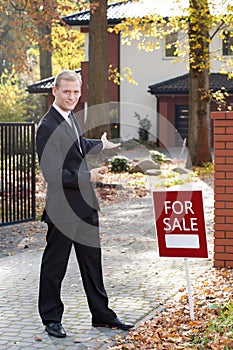 Smiling estate agent