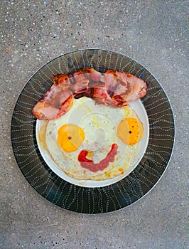 Smiling Face Fried Eggs with Bacon Breakfast