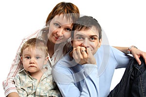 Smiling family: baby, man, woman