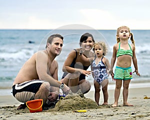 Smiling Family on Beach