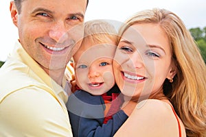 Smiling family. faces closeup