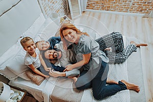 Smiling family spending time together in morning