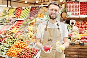 Smiling Farmer Posing at Market