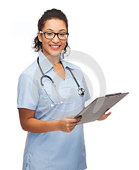 Smiling female african american doctor or nurse