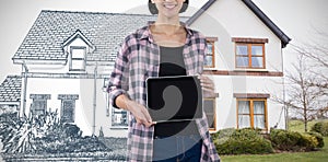 Composite image of smiling female architect showing digital tablet against white background