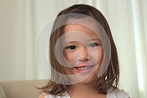 Smiling female bi-racial asian toddler