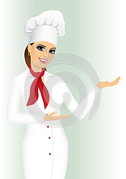 Smiling female chef, cook or baker holding something