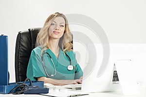 Smiling female doctor holding medical records