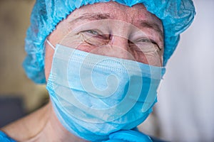 Smiling female doctor in hospital hallway