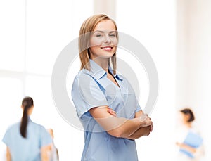 Smiling female doctor or nurse