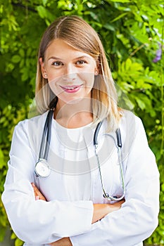 Smiling female doctor outdoor