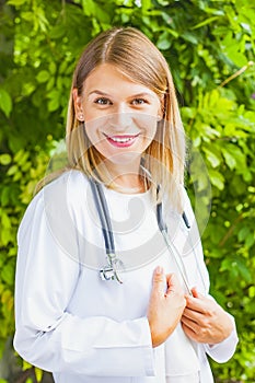 Smiling female doctor outdoor