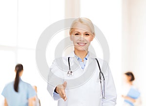 Smiling female doctor with stethoscope