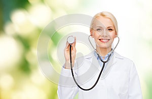 Smiling female doctor with stethoscope