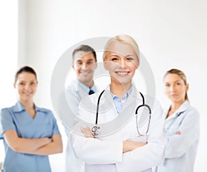 Smiling female doctor with stethoscope