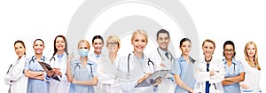 Smiling female doctors and nurses with stethoscope