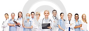 Smiling female doctors and nurses with stethoscope