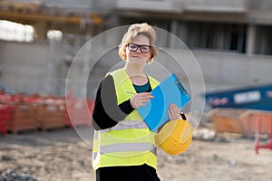 Smiling female engineer posing