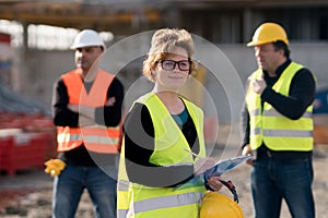 Smiling female engineer posing