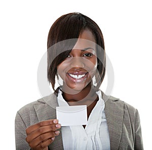 Smiling female executive with business card