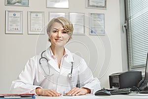 Smiling female medico doing her work