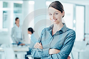 Smiling female office worker portrait