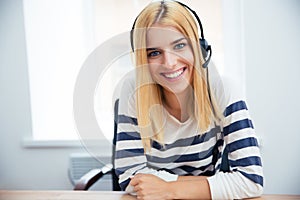 Smiling female operator with headset