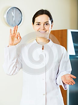 Smiling female physician indoors