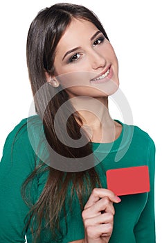 Smiling female showing blank credit card