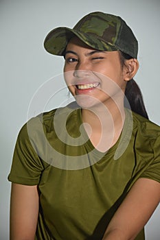 A Smiling Female Soldier Winking