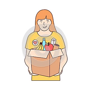 Smiling female volunteer carrying box with fruits and other products isolated on white background. Food donation