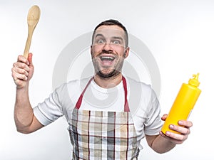 Smiling freak wants to cook something special and tasty.. He is not afraid of failrules. Isolated on white background.