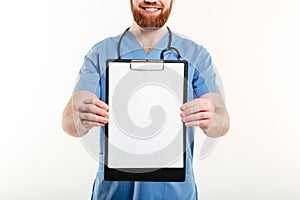 Smiling friendly medical doctor or nurse with stethoscope