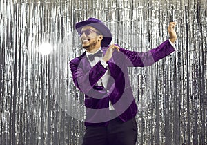 Smiling African American entertainer on disco background