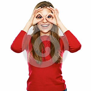 Smiling funny woman in red posing against white background.