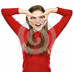 Smiling funny woman in red posing against white background.