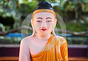 Smiling Gautama Buddha at Haw Par Villa, Singapore
