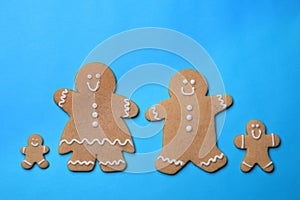 Smiling GingerBread People on Blue Background