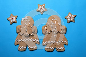 Smiling GingerBread People on Blue Background