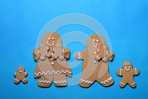 Smiling GingerBread People on Blue Background