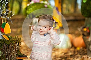 Smiling girl in the autumn park