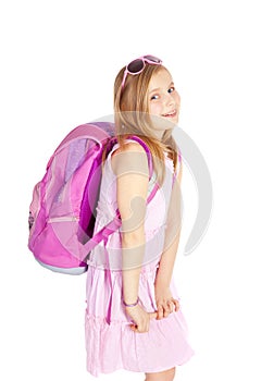Smiling girl with backpack over white